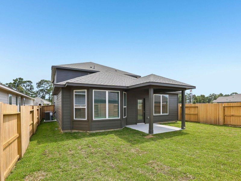 Exterior details and patio area of a home in Granger Pointe - Premier Series, Conroe (Image 25).