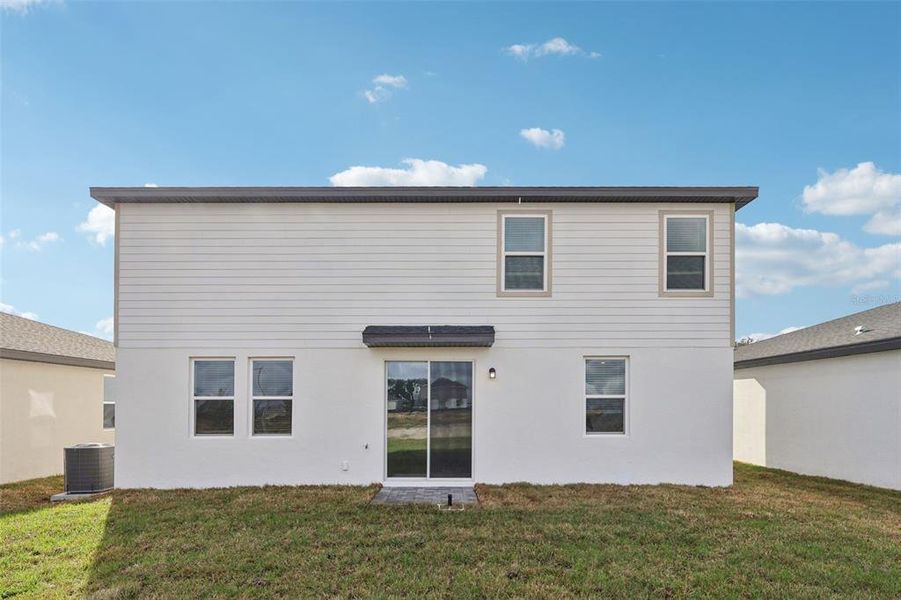 Exterior details and patio area of a home in , Davenport (Image 21).