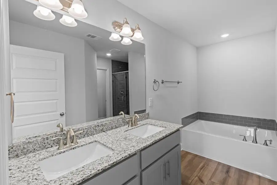 Furnished interior view inside a new home in River Ranch Trails, Dayton (Image 9).