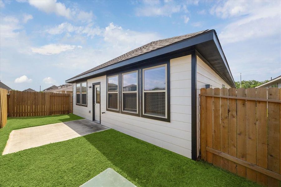 Front exterior of a new home in Sandrock Station, Houston, TX, highlighting curb appeal (Image 1). Front exterior of a new home in Sandrock Station, Houston, TX, highlighting curb appeal (Image 1).