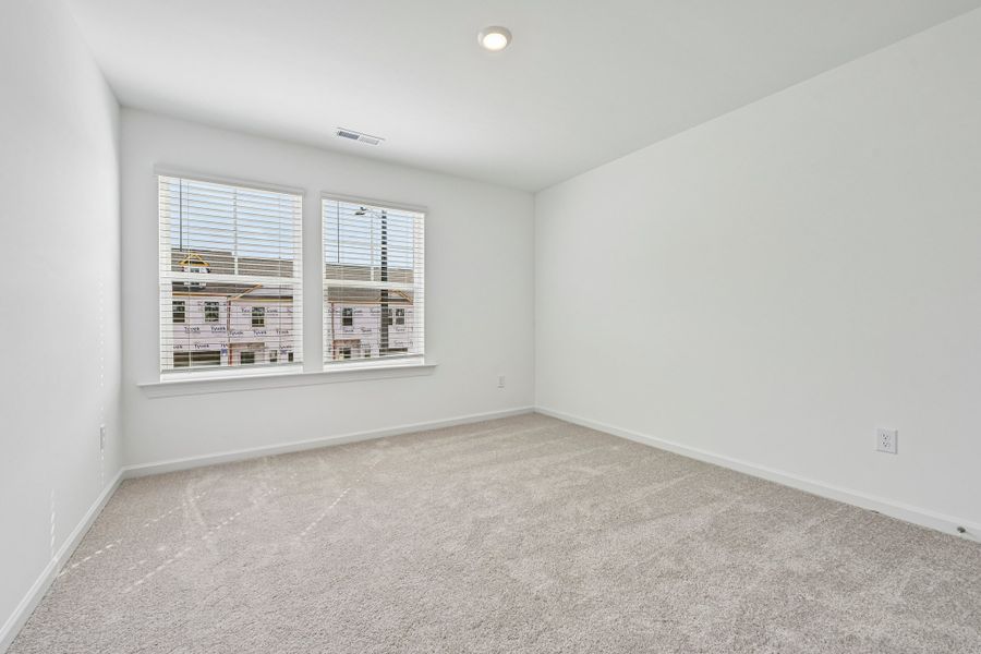 Spacious, unfurnished interior of a new home in Forestville Station, Wake Forest (Image 32).