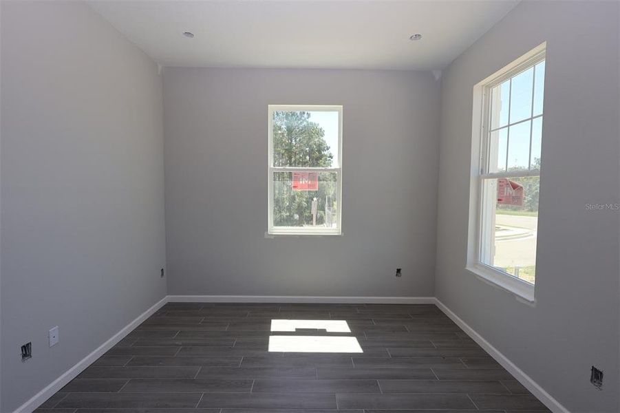 Spacious, unfurnished interior of a new home in Tribute at Ovation, Winter Garden (Image 24).