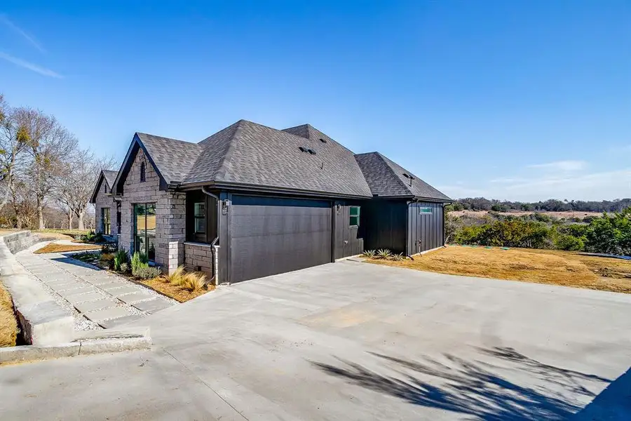 Front exterior of a new home in , Cresson, TX, highlighting curb appeal (Image 26).