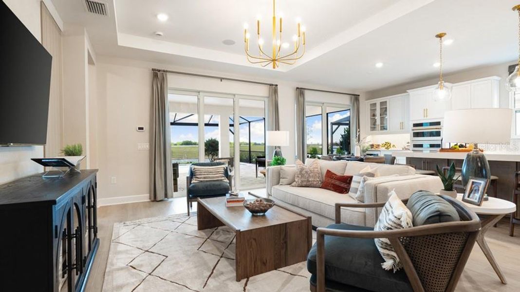 Furnished interior view inside a new home in Esplanade at Starling, Punta Gorda (Image 14).