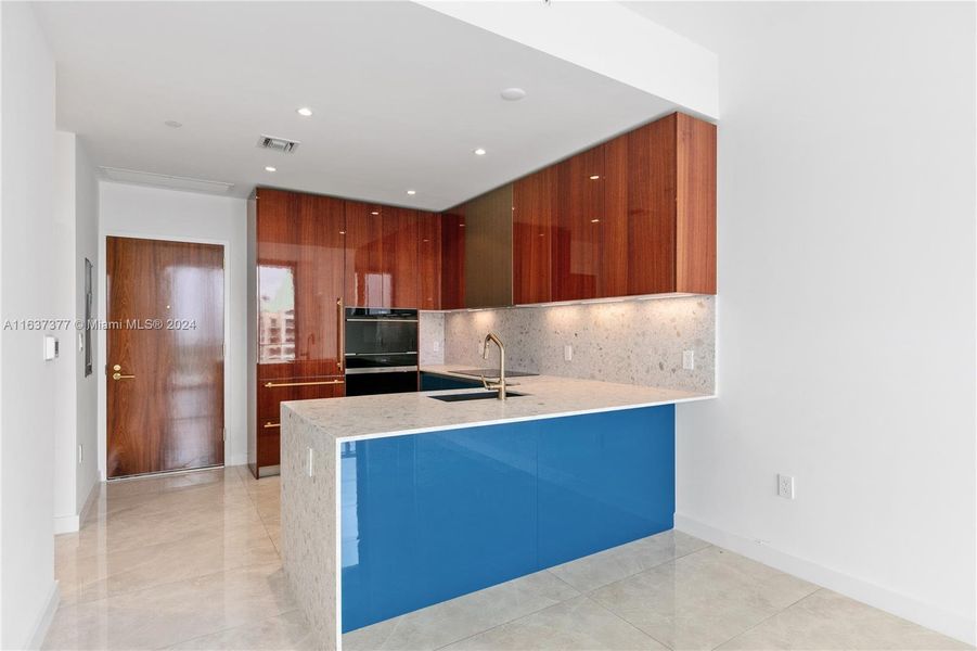 Kitchen & front door.