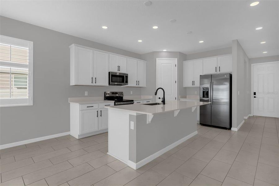 Furnished interior view inside a new home in Seasons at Lakeside Forest, Tavares (Image 11).