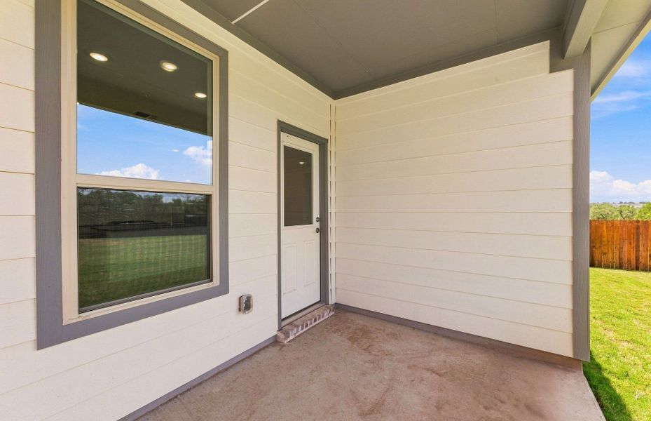 Exterior details and patio area of a home in Saddleback at Santa Rita Ranch, Liberty Hill (Image 3).
