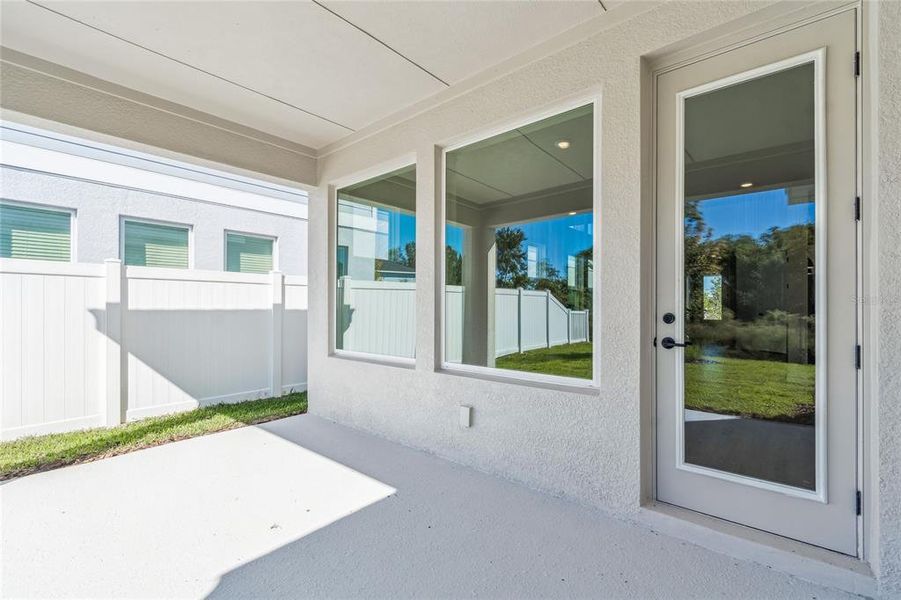 Exterior details and patio area of a home in Persimmon Park - Garden Series, Wesley Chapel (Image 24).