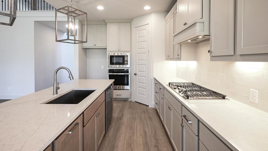 Furnished interior view inside a new home in 6 Creeks, Kyle (Image 8).