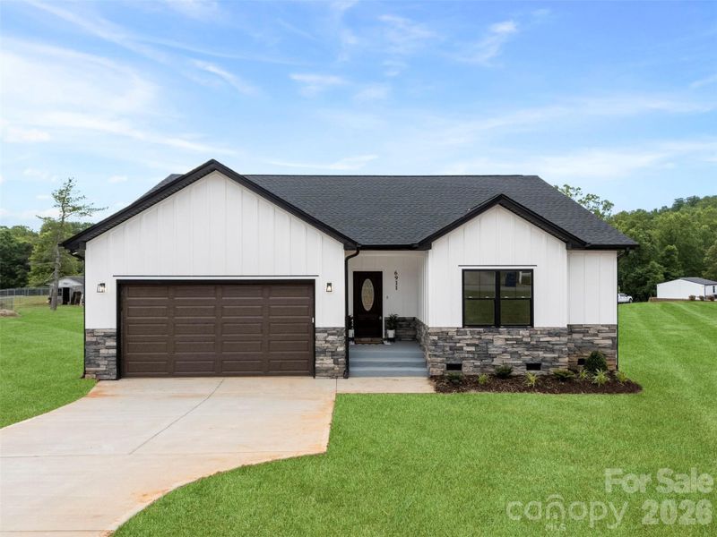 Front exterior of a new home in , Connelly Springs, NC, highlighting curb appeal (Image 25).