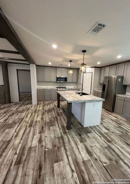 Furnished interior view inside a new home in , Knippa (Image 3). Furnished interior view inside a new home in , Knippa (Image 3).