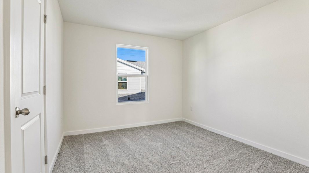 Furnished interior view inside a new home in Cyrene at Harmony, St. Cloud (Image 16).