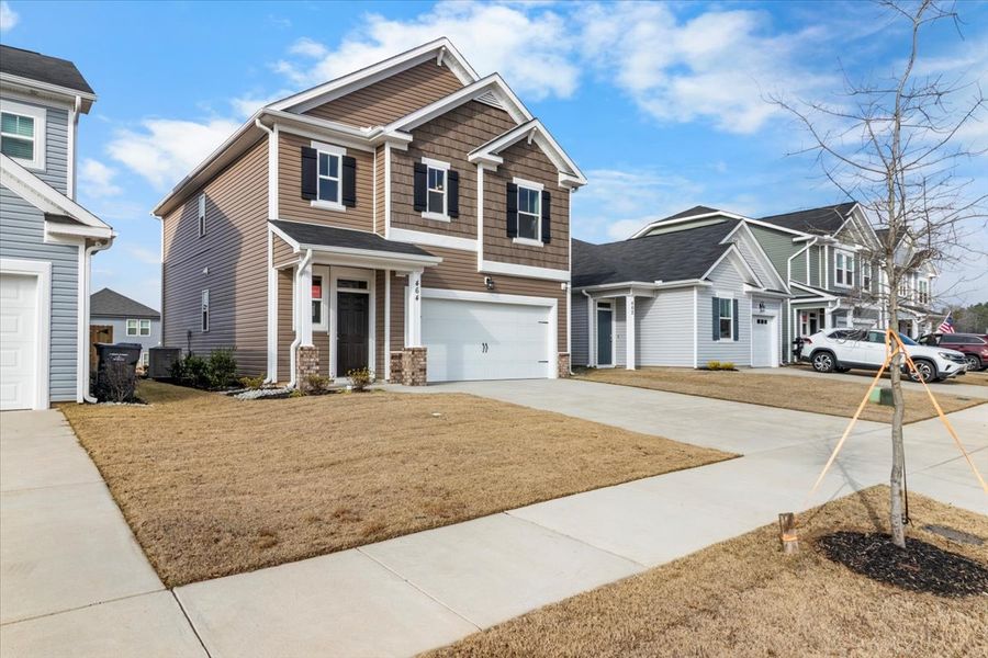 Front exterior of a new home in Windsor, North Augusta, SC, highlighting curb appeal (Image 17).