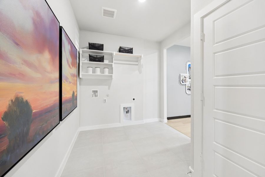 Utility Room in a Belmont Magnolia Model Home in Aubrey TX by Trophy Signature Homes