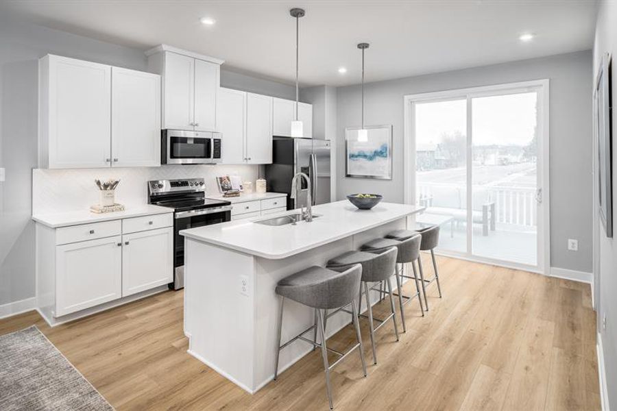 Representative furnished interior of a home built from the Mayer by Ryan Homes in Stowe Branch Townhomes, Charlotte (Image 3).