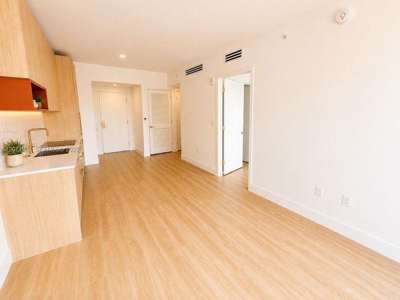 Spacious, unfurnished interior of a new home in , Miami (Image 9). Spacious, unfurnished interior of a new home in , Miami (Image 9).