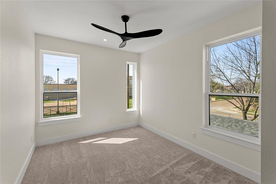 Unfurnished room with ceiling fan, carpet flooring, and recessed lighting
