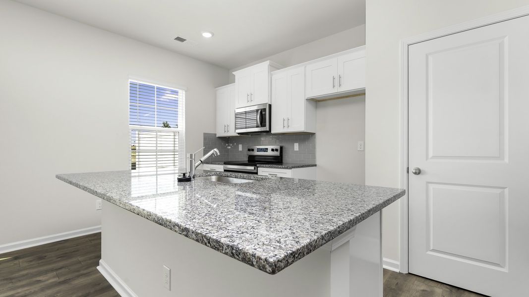 Furnished interior view inside a new home in The Gables at Edinborough Townes, Gibsonville (Image 7). Furnished interior view inside a new home in The Gables at Edinborough Townes, Gibsonville (Image 7).