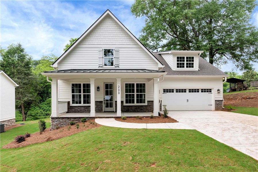 Front exterior of a new home in , Commerce, GA, highlighting curb appeal (Image 24).
