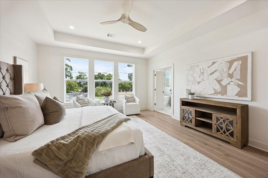 Take a deep breath. You’re home now. Relax and unwind in this spacious owner’s retreat, where soft natural light, warm white oak flooring and a stunning ensuite bathroom create a peaceful setting to begin and end your day.
