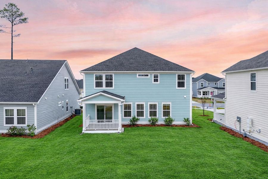 Exterior details and patio area of a home in The Coves at Lakes of Cane Bay, Summerville (Image 28).