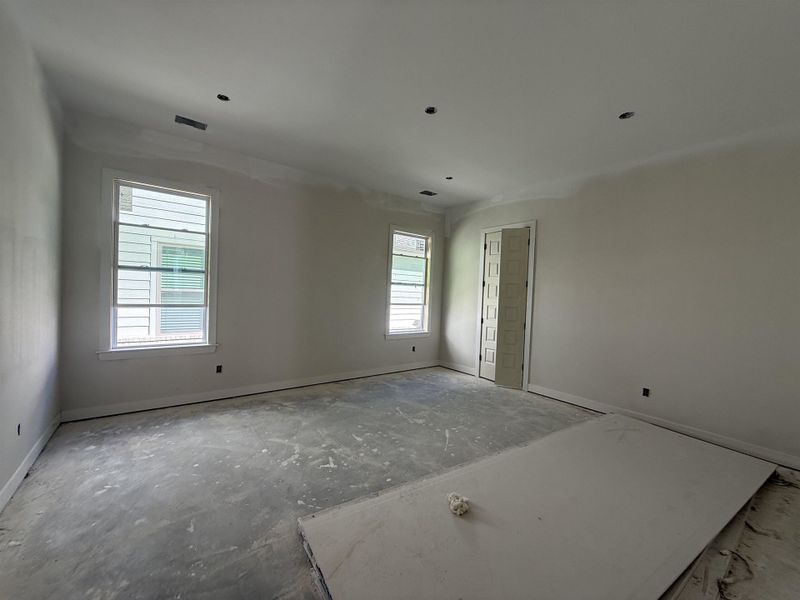 Unfurnished room with baseboards