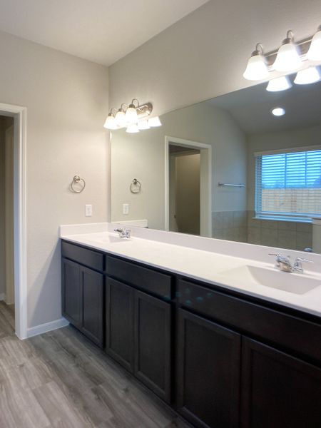 Representative furnished interior of a home built from the Floor Plan 1816 by Colina Homes in Grand Magnolia, Magnolia (Image 12). Representative furnished interior of a home built from the Floor Plan 1816 by Colina Homes in Grand Magnolia, Magnolia (Image 12).