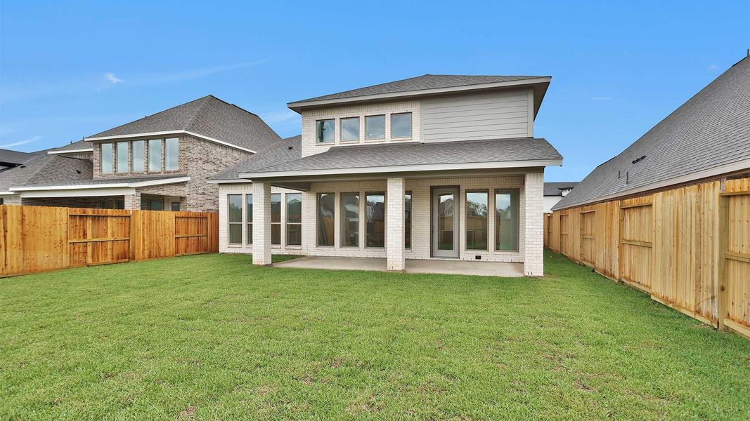 Exterior details and patio area of a home in Sienna 50', Missouri City (Image 1). Exterior details and patio area of a home in Sienna 50', Missouri City (Image 1).