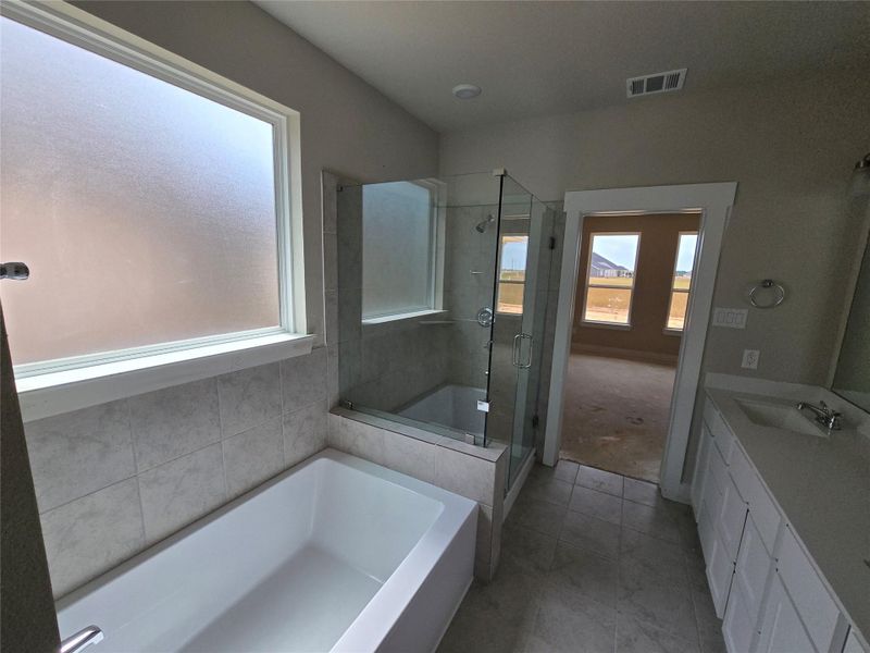 Rinse off the stresses of your day in this oversized shower.