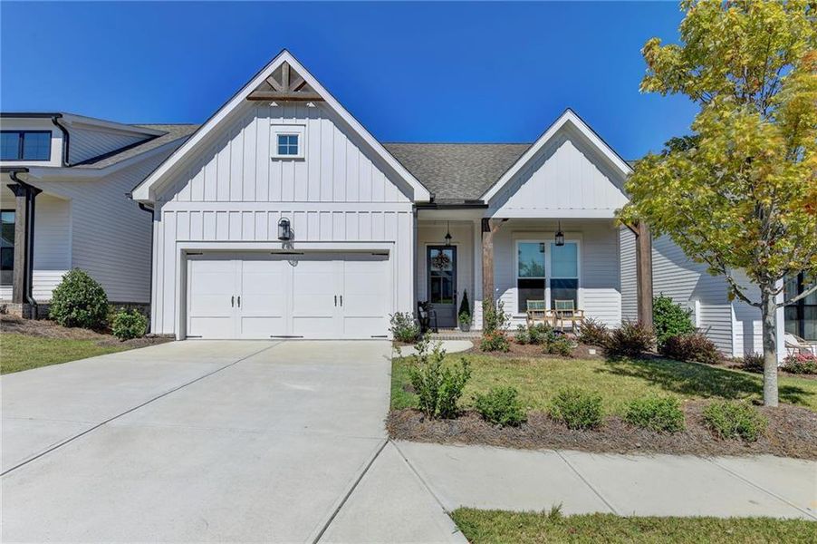 Front exterior of a new home in , Canton, GA, highlighting curb appeal (Image 27).
