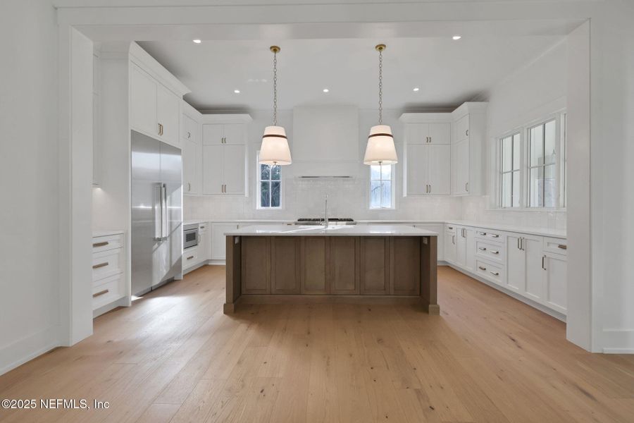 Furnished interior in a model home at River Landing at Nocatee (DF Luxury Homes) in Ponte Vedra (Image 5).