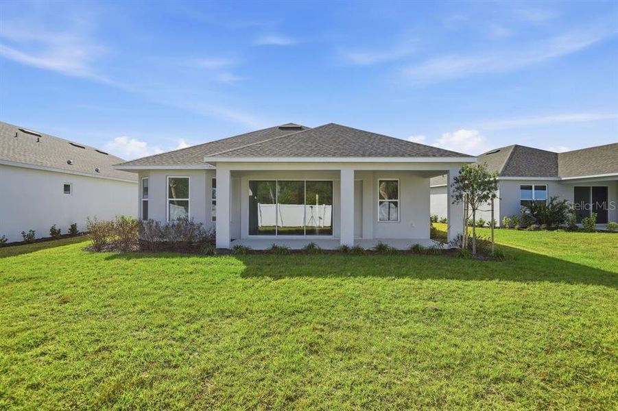 Exterior details and patio area of a home in Esplanade at Westview, Kissimmee (Image 3).