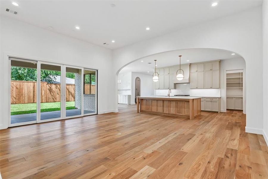Expansive open-concept layout filled with natural light from Pella windows