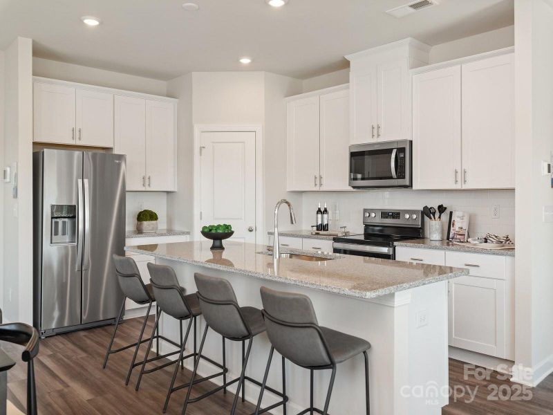 Photo is not of the actual home, but is an inspirational photo of builder’s model home and may depict options, furnishings, and/or decorator features that are not included Photo is not of the actual home, but is an inspirational photo of builder’s model home and may depict options, furnishings, and/or decorator features that are not included