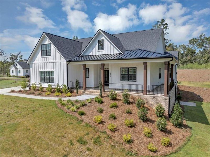 Front exterior of a new home in , Ball Ground, GA, highlighting curb appeal (Image 21).