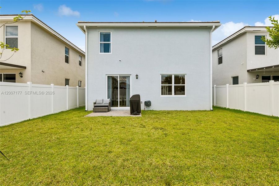 Exterior details and patio area of a home in Messina Place, Homestead (Image 4).