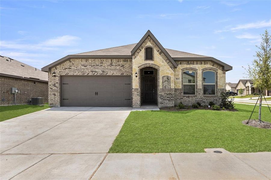 Front exterior of a home in the Brookville Ranch community, located in Fort Worth, TX (Image 6).