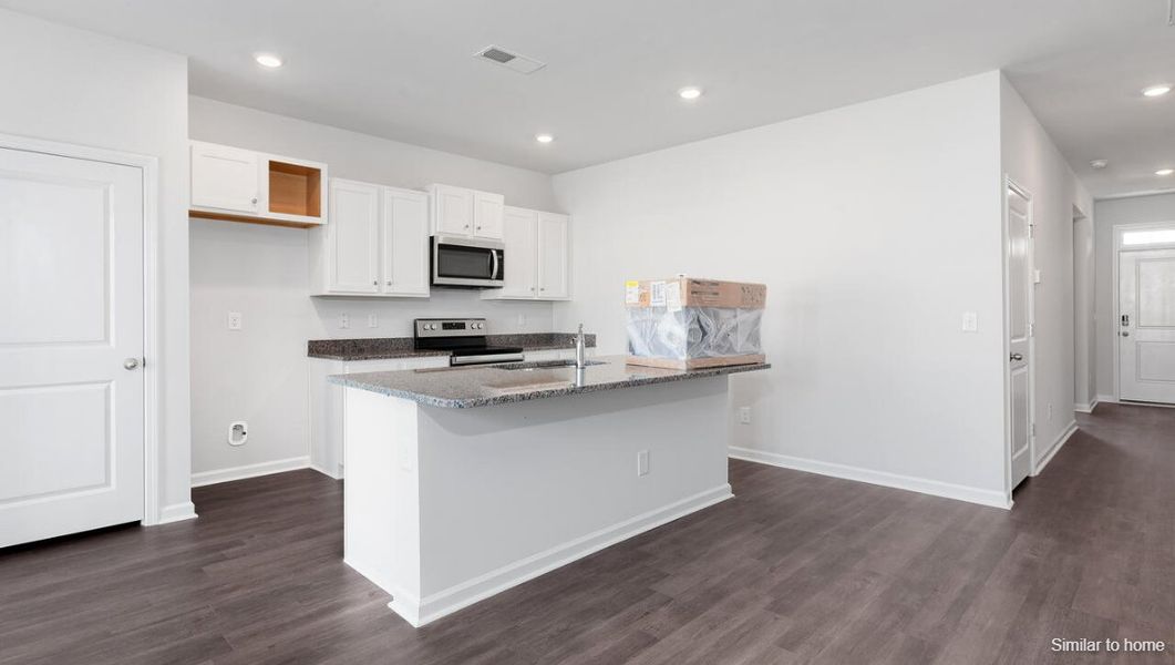 Furnished interior view inside a new home in Bella Point, Bolivia (Image 7).