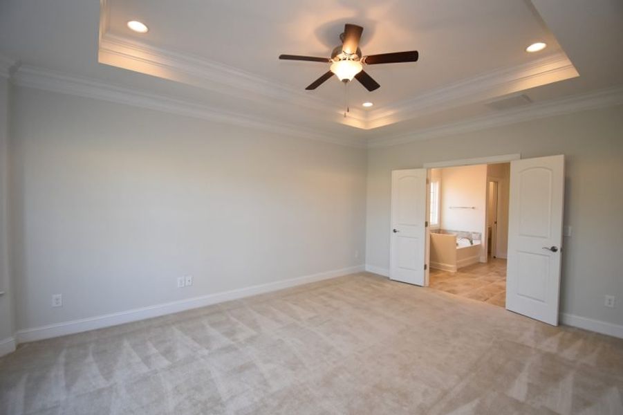 Representative unfurnished interior of a home built from the Cambridge by Keystone Homes NC in Weybridge, Burlington (Image 55).