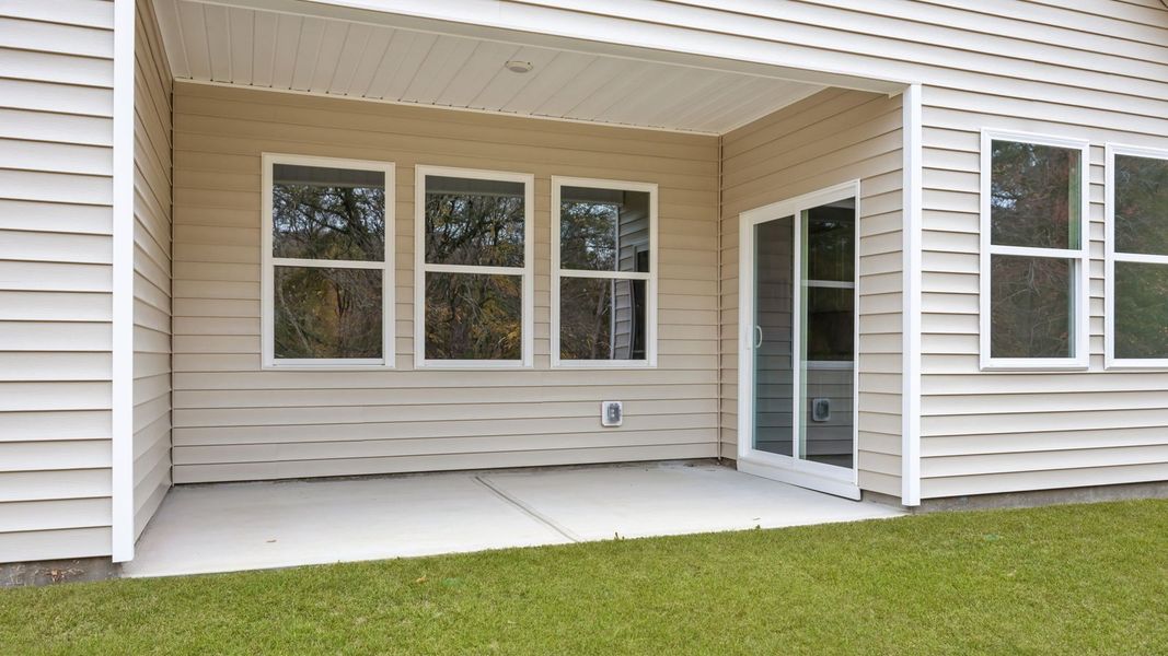 Exterior details and patio area of a home in Villa Grande, Winterville (Image 18).