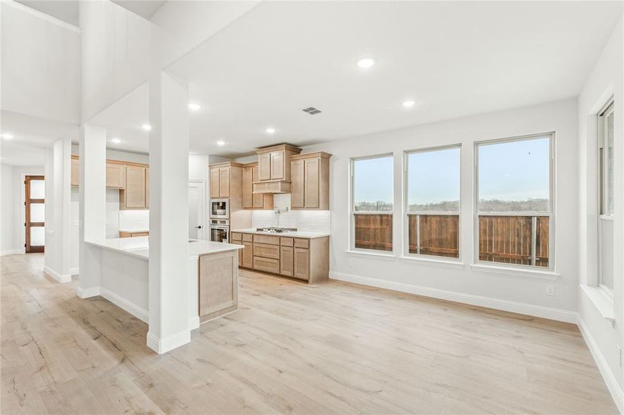 Furnished interior view inside a new home in Stone River Glen, Royse City (Image 8).