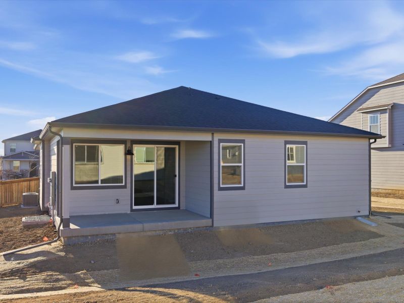 Exterior details and patio area of a home in Buffalo Highlands: The Canyon Collection, Commerce City (Image 3).