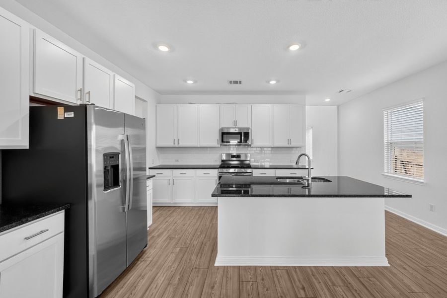 Furnished interior view inside a new home in Sunfield, Buda (Image 16).