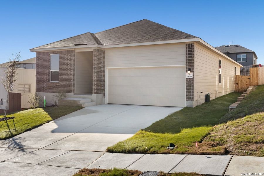 Front exterior of a new home in Knox Ridge, Converse, TX, highlighting curb appeal (Image 19).