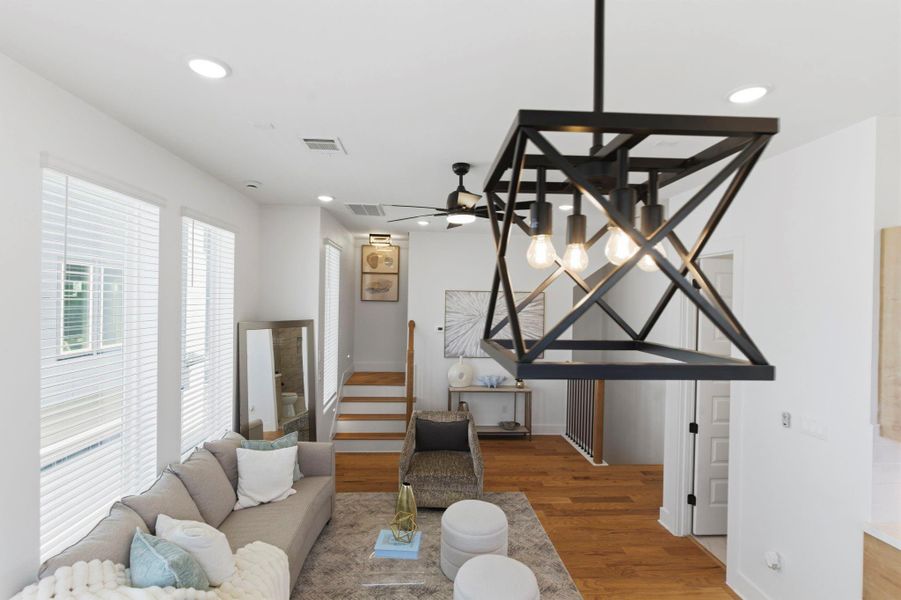 Open-concept living space on the second floor, perfect for relaxing or entertaining, seamlessly connected to the heart of the home.