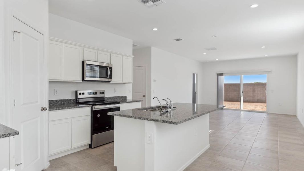 Furnished interior view inside a new home in Radiance at Superstition Vistas, Apache Junction (Image 4). Furnished interior view inside a new home in Radiance at Superstition Vistas, Apache Junction (Image 4).