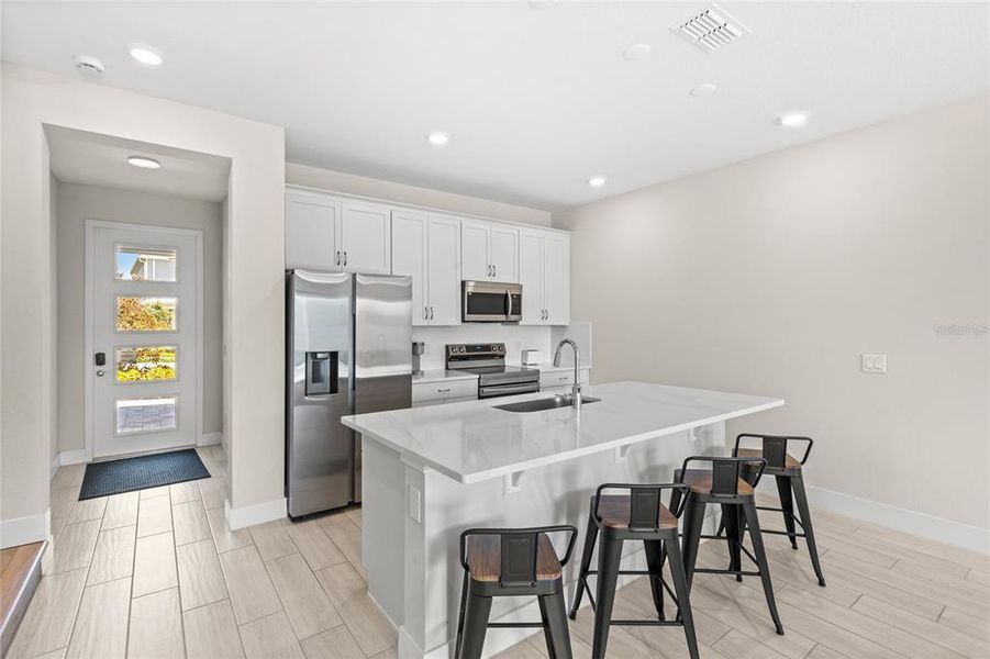Furnished interior view inside a new home in , Kissimmee (Image 3).