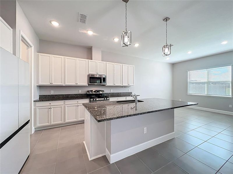 Furnished interior view inside a new home in , Winter Garden (Image 11).