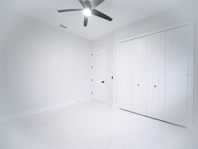 Spacious, unfurnished interior of a new home in , Port Charlotte (Image 36).