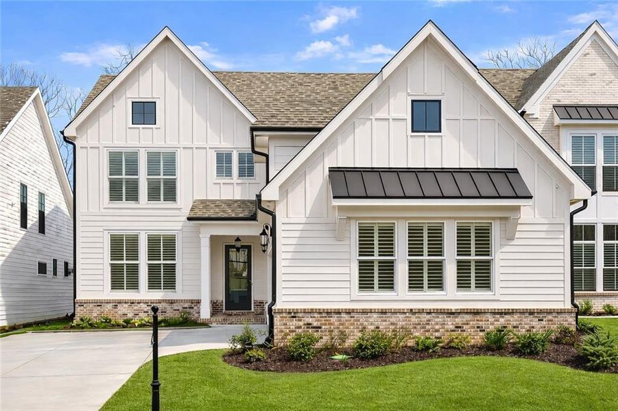 Front exterior of a new home in Waterside Single Family, Peachtree Corners, GA, highlighting curb appeal (Image 2).